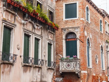 VENICE, ITALY - on MAY 3, 2015. Typical architectural details of ancient houses in island part of the city