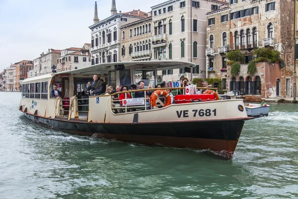 VENICE, ITALY - on MAY 3, 2015. Vaporetto with passengers floats on the Grand channel (Canal Grande). Vaporetto is a main type of public transport in Venice — Stock Photo, Image