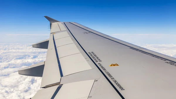 Picturesque heavenly landscape. A view from the window of the plane flying over clouds — Stock Photo, Image