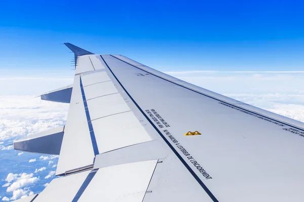 Picturesque heavenly landscape. A view from the window of the plane flying over clouds — Stock Photo, Image