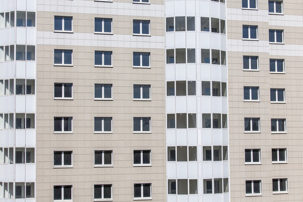 PUSHKINO, RUSSIA, on Aug 11, 2015. Фрагмент фасада нового жилого дома
