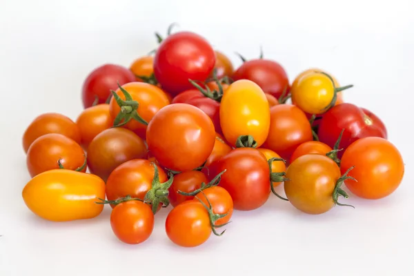 Cherry tomatoes of various grades — Stock Photo, Image