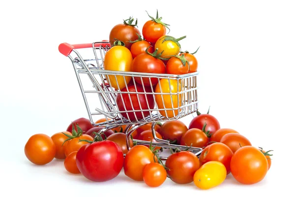 Cherry tomatoes of various grades in the cart from hypermarket — Stock Photo, Image