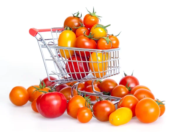 Cherry tomatoes of various grades in the cart from hypermarket — Stock Photo, Image