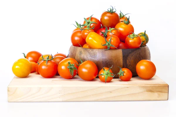 Cherry tomatoes of various grades in the bowl — Stock Photo, Image