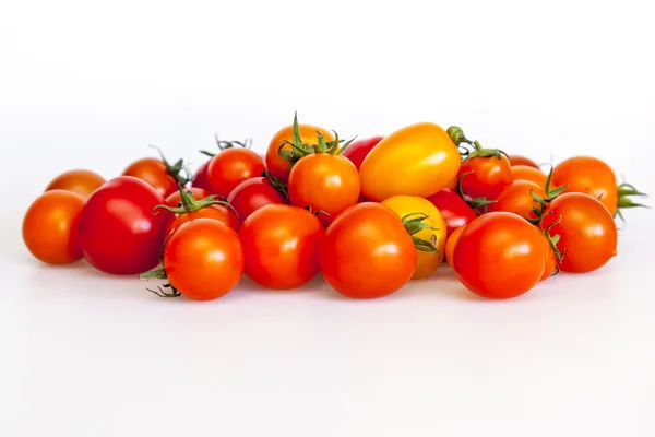 Cherry tomatoes of various grades — Stock Photo, Image