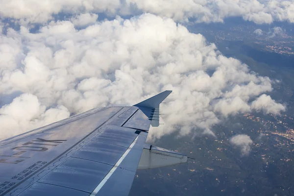 Plane view from the window on picturesque white clouds — Stock Photo, Image