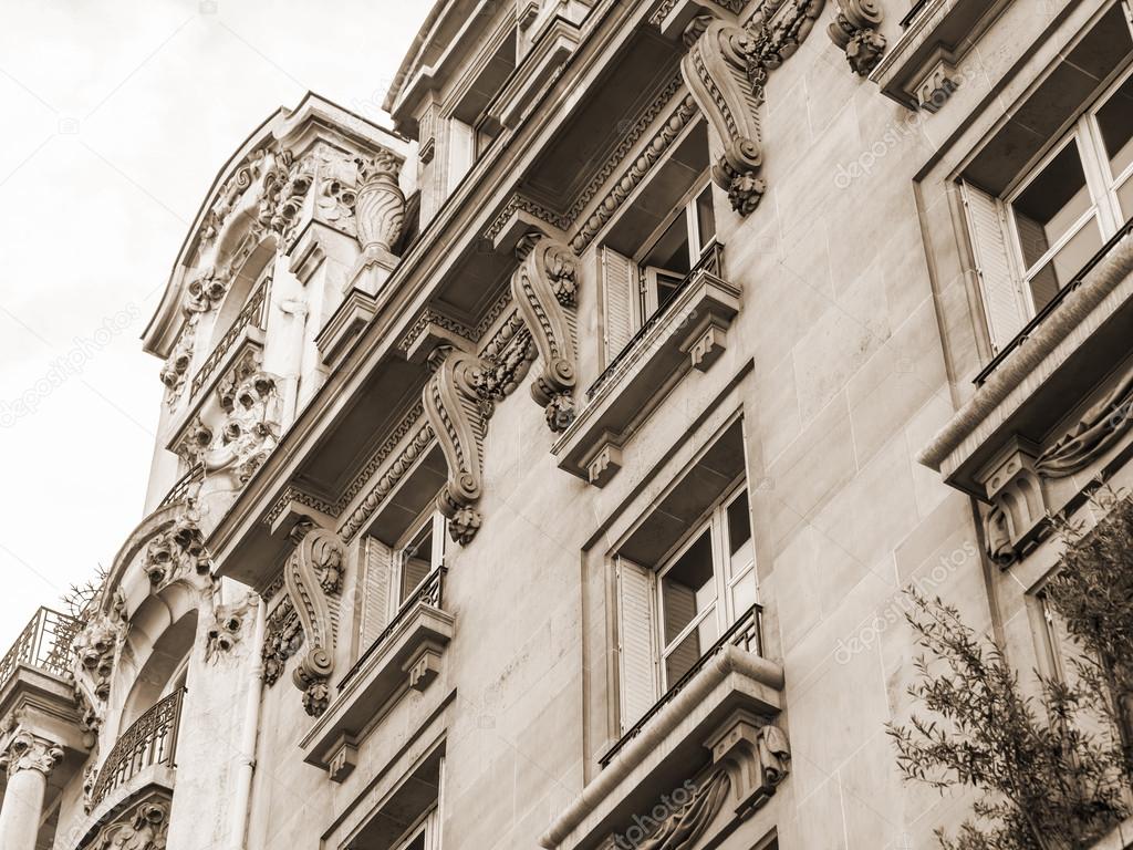 PARIS, FRANCE, on AUGUST 26, 2015. A fragment of a typical facade of the building on Haussman Boulevard