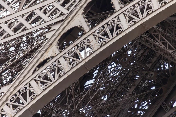 PPARIS, FRANCE, on SEPTEMBER 1, 2015. Fragment of a design of the Eiffel Tower. The Eiffel Tower is one of the most visited and recognizable sights of the world — Stock Photo, Image