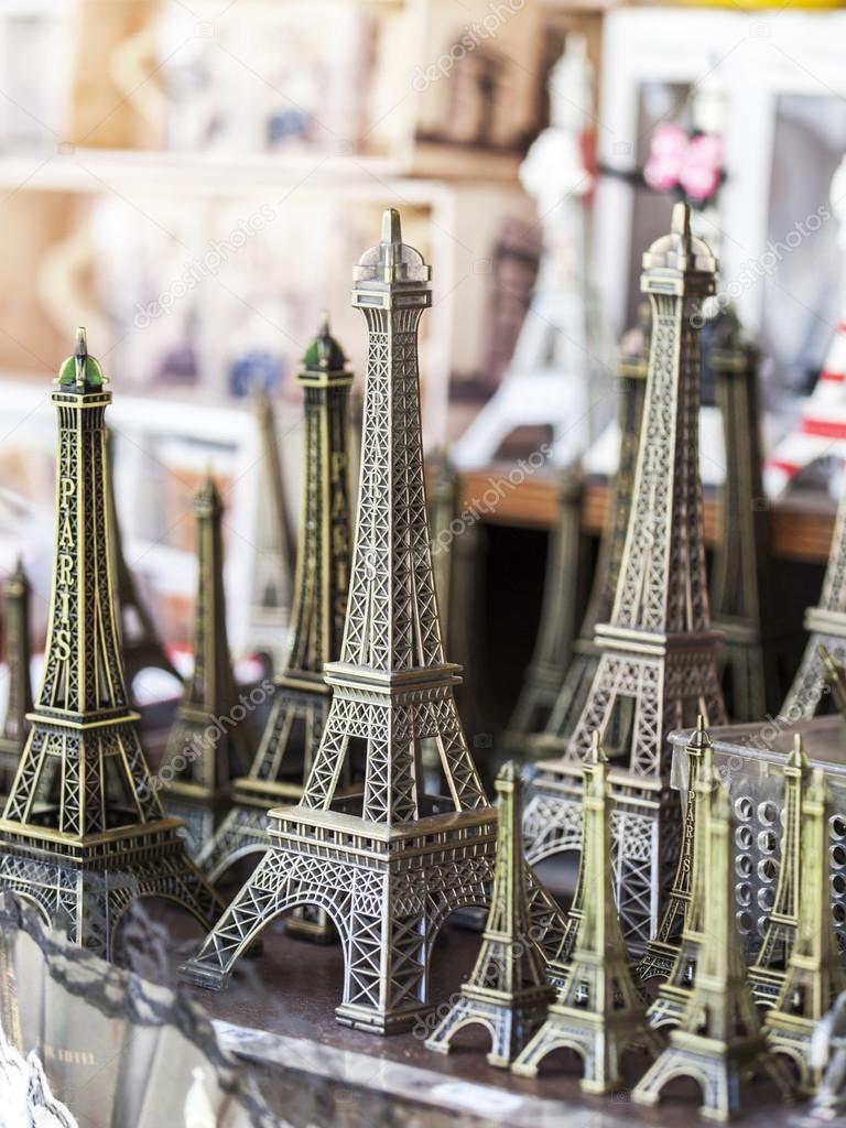 PARIS, FRANCE, on AUGUST 29, 2015. Trade in souvenirs. A souvenir in the form of the Eiffel Tower - a traditional gift from Paris