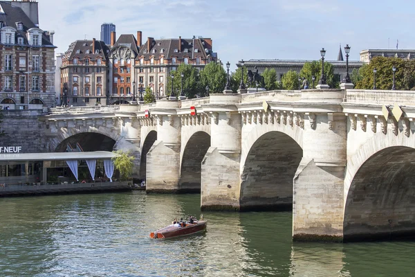 PARIS, FRANCE, on AUGUST 29, 2015. Novy Bridge (fr. Pont Neuf) - he oldest of the remained bridges of Paris through the river Seine