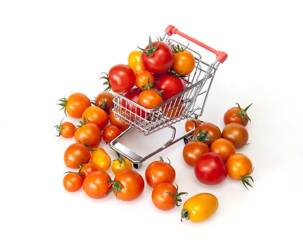 Cherry tomatoes in the cart for purchases — Stock Photo, Image