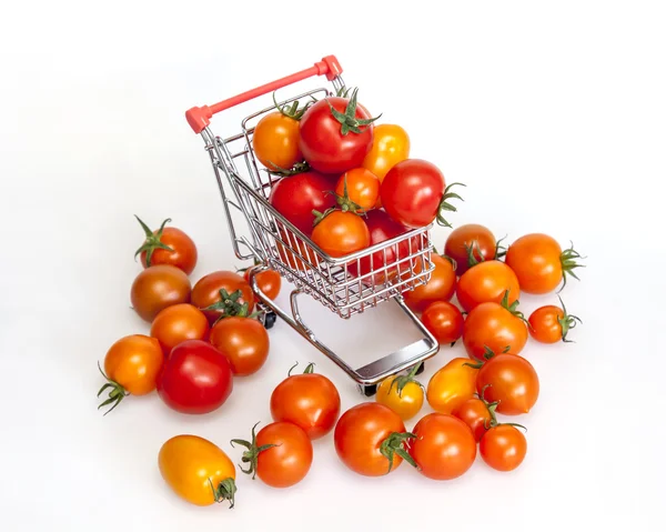 Cherry tomatoes in the cart for purchases — Stock Photo, Image