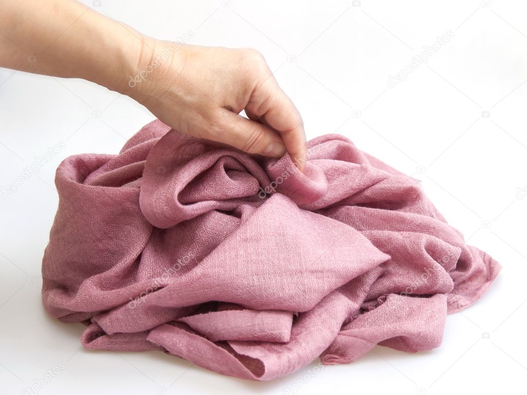 Pink fabric in a hand