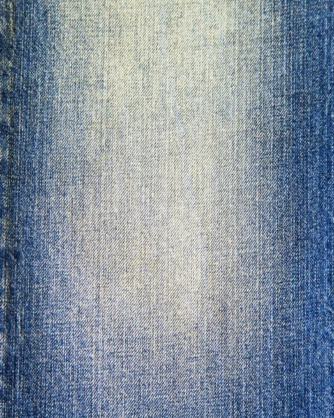 Текстура обветшалой джинсы — стоковое фото