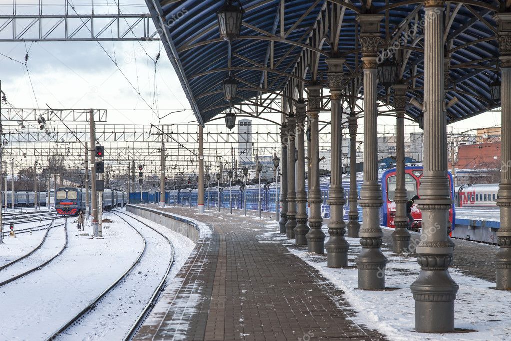 MOSCOW, RUSSIA, on DECEMBER 17, 2015. Winter day. The suburban electric train comes nearer to the platform of the Yaroslavl railway station.