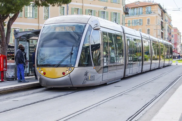 NICE, FRANCE, on JANUARY 7, 2016. The high-speed tram moves on the city street — Stock Photo, Image