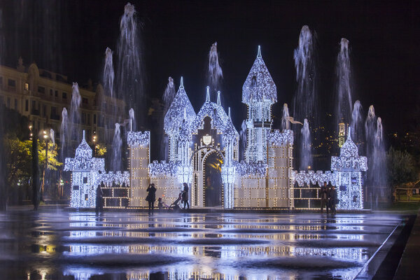 NICE, FRANCE - on JANUARY 8, 2016. The flat fountain and Christmas constructions in Promenade du Paillon park. Night look.