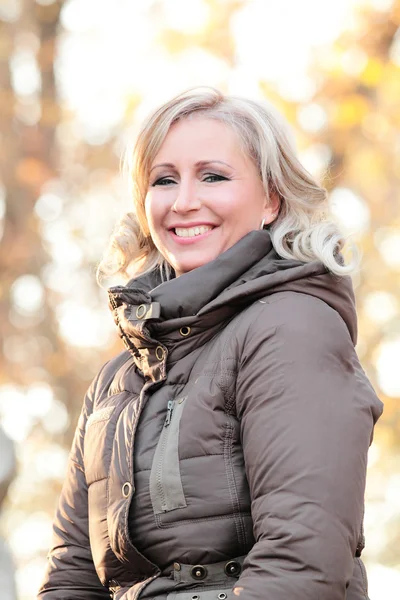 Blond woman in autumn — Stock Photo, Image