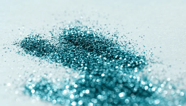 Blue glitter op achtergrond — Stockfoto