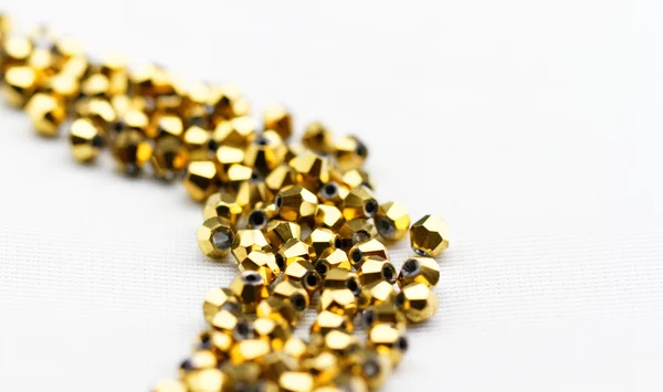 Contas de vidro dourado — Fotografia de Stock
