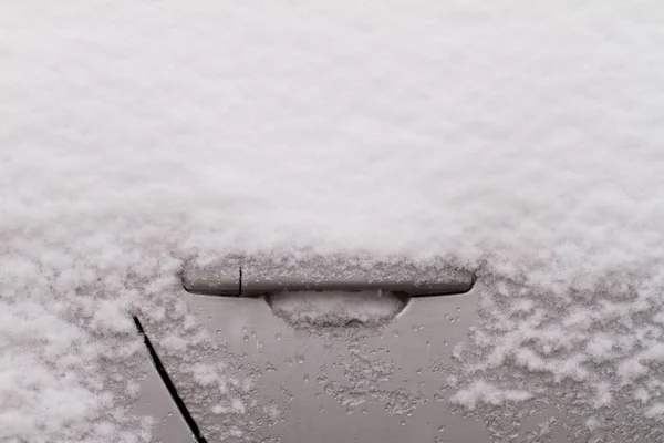 Car's snowy door — Stock Photo, Image