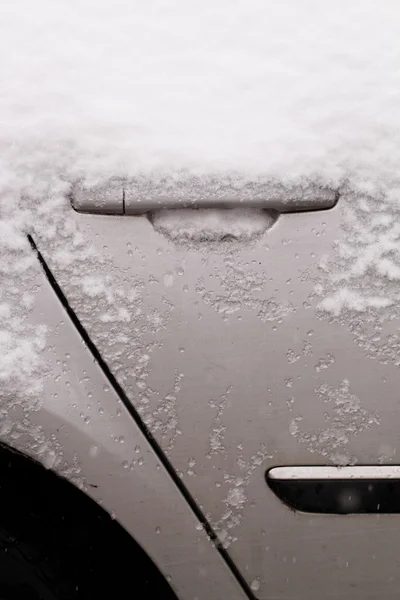 Car's snowy door — Stock Photo, Image