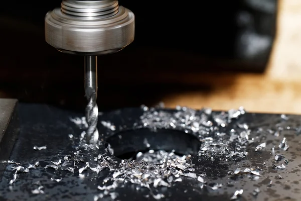 CNC drilling with shavings — Stock Photo, Image