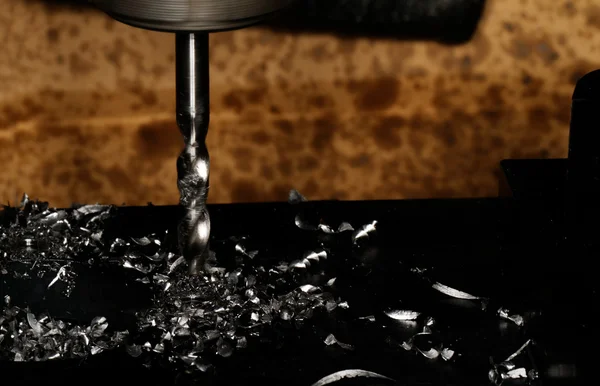 CNC drilling with shavings — Stock Photo, Image