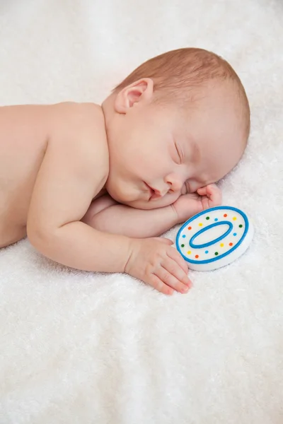 Newborn baby lying in bed — Stock Photo, Image