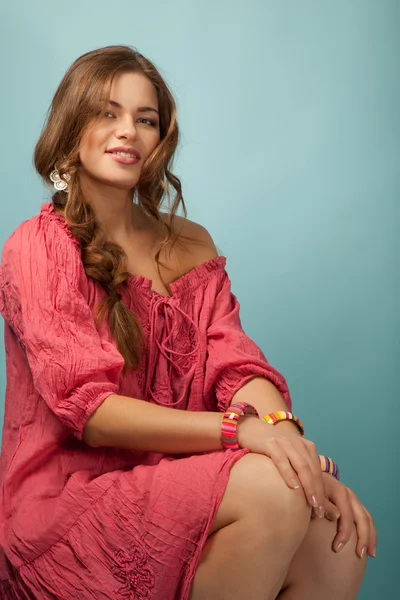 Beautiful woman with accessories on the blue background — Stock Photo, Image