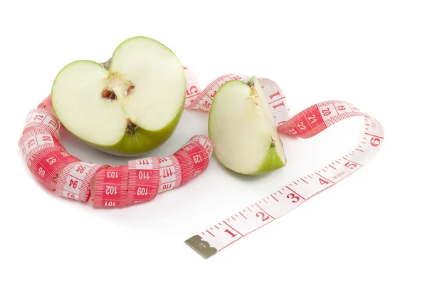 Picture of green apple and tape measure — Stock Photo, Image