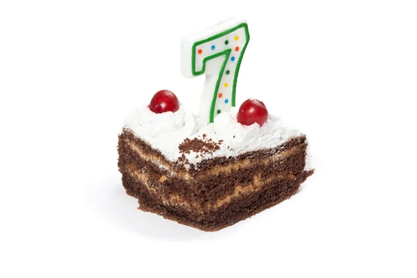 Torta di compleanno con candela numero sette — Foto Stock