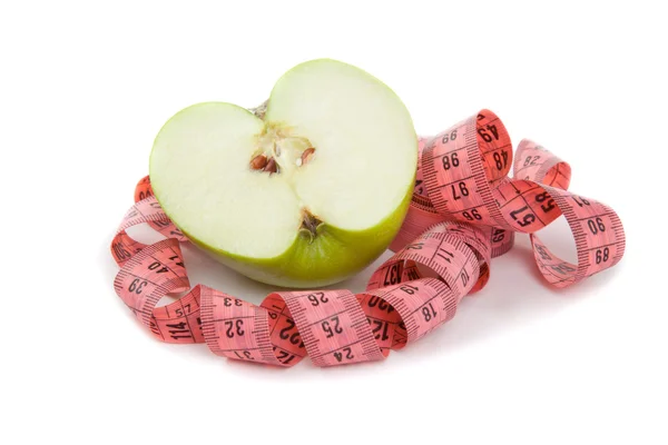 Picture of green apple and tape measure — Stock Photo, Image