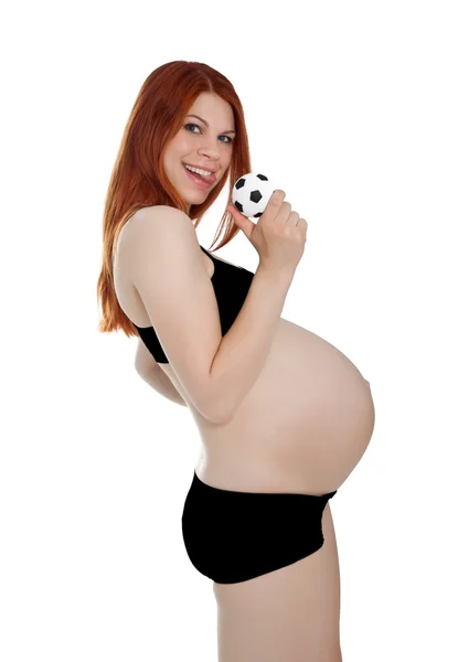 Beautiful pregnant woman with small football in her hand's isola — Stock Photo, Image