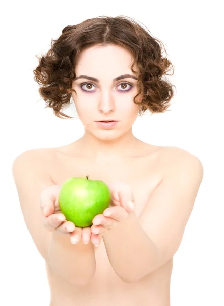 Menina segurando uma maçã (foco na menina ) — Fotografia de Stock