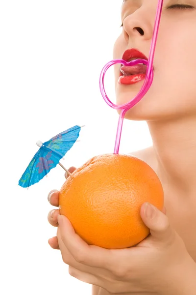 Woman with fruit and pink straw — Stock Photo, Image