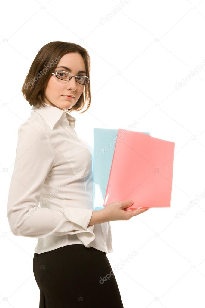 Picture of businesswoman in white demonstrating two folders