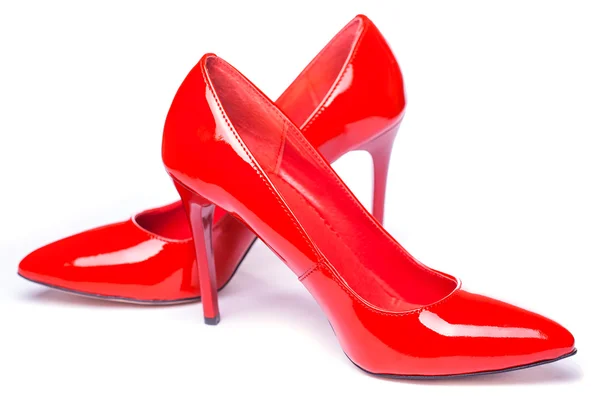 Rode schoenen geïsoleerd op witte achtergrond — Stockfoto