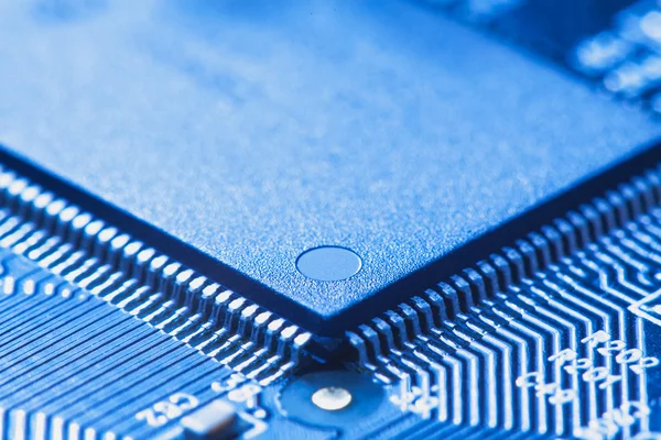 Microchip integrated on motherboard — Stock Photo, Image