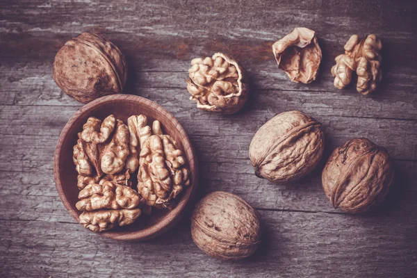 Walnut on rustic old wooden table — Stock Photo, Image