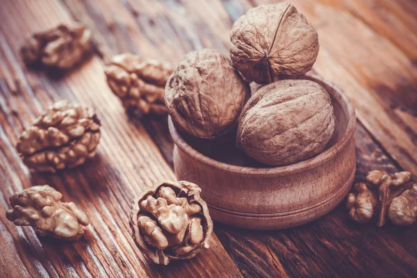 Walnut on rustic old wooden table — Stock Photo, Image