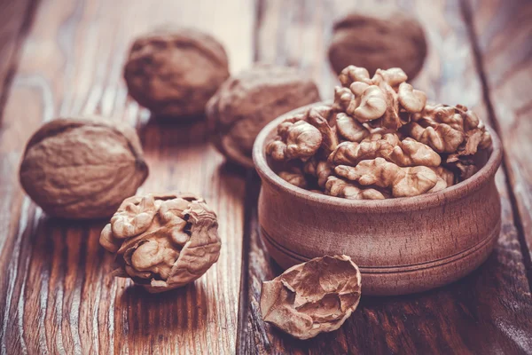 Walnut on rustic old wooden table — Stock Photo, Image