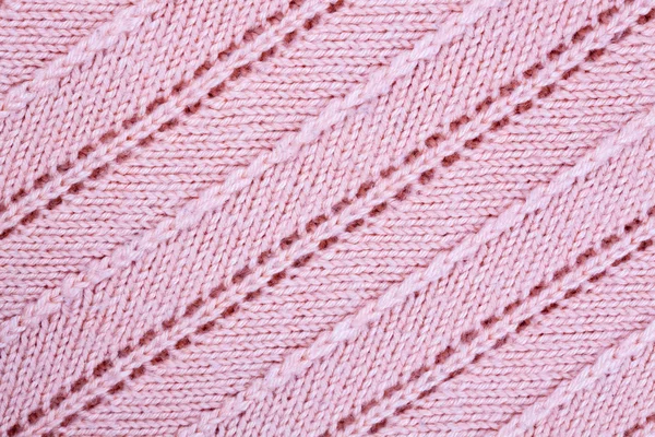 Roze gebreid patroon stof achtergrond — Stockfoto
