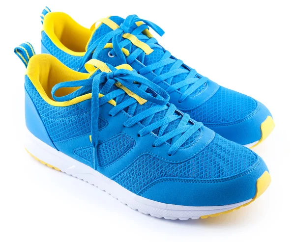 Paire de chaussures de sport bleues sur fond blanc — Photo