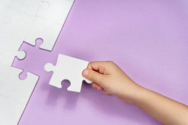 Child Hands Makes Last Missing Piece Puzzle Violet Strategy Business — Stock Photo, Image