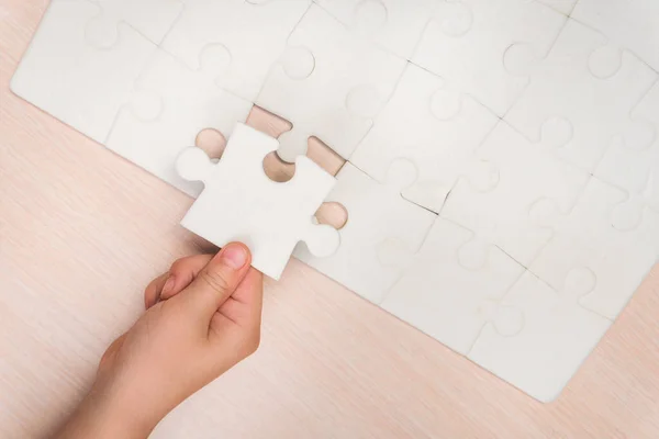 Child Hand Makes Last Missing Piece Puzzle Table Strategy Business — Stock Photo, Image