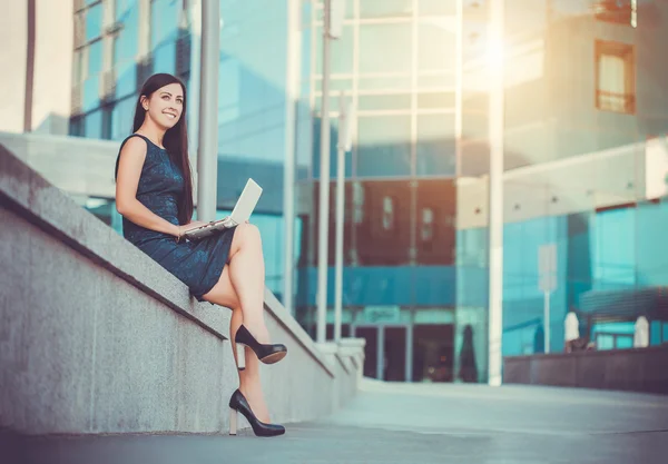 Successful Businesswoman with laptop — Stock Photo, Image