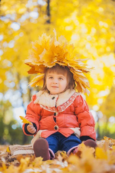Happy playful baby in the autumn park — Stock Photo, Image