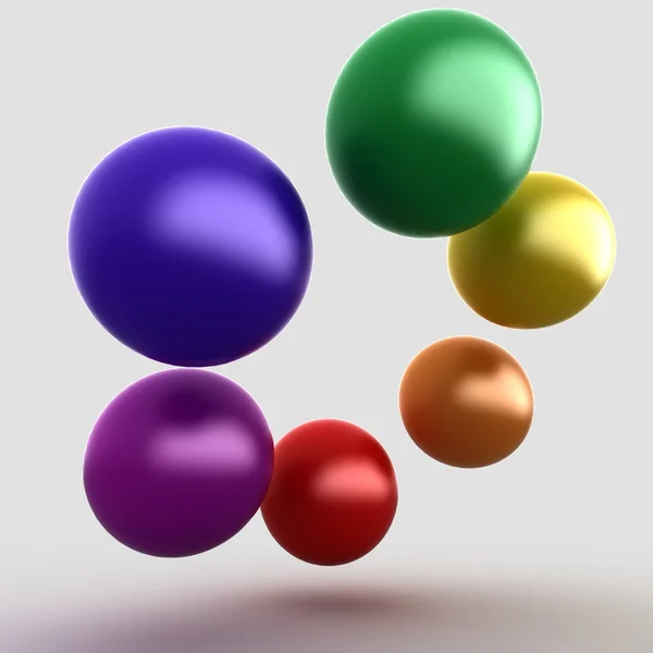 Colorful glossy balls on gray — Stock Photo, Image